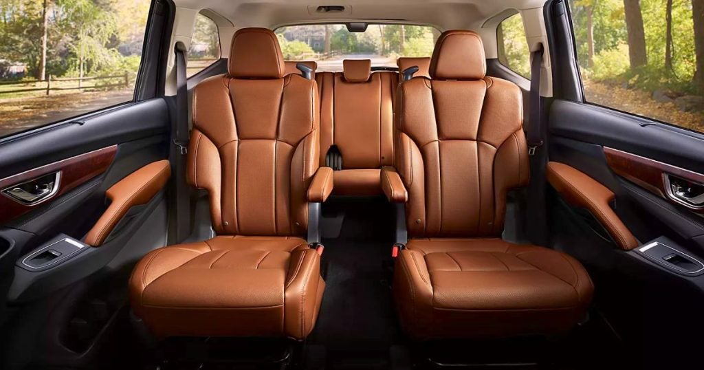 Subaru Ascent cabin with tan leather second-row captain's chairs and a third-row bench