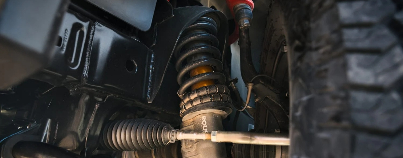 Suspension close-up on a 2026 Nissan Frontier PRO-4X R 