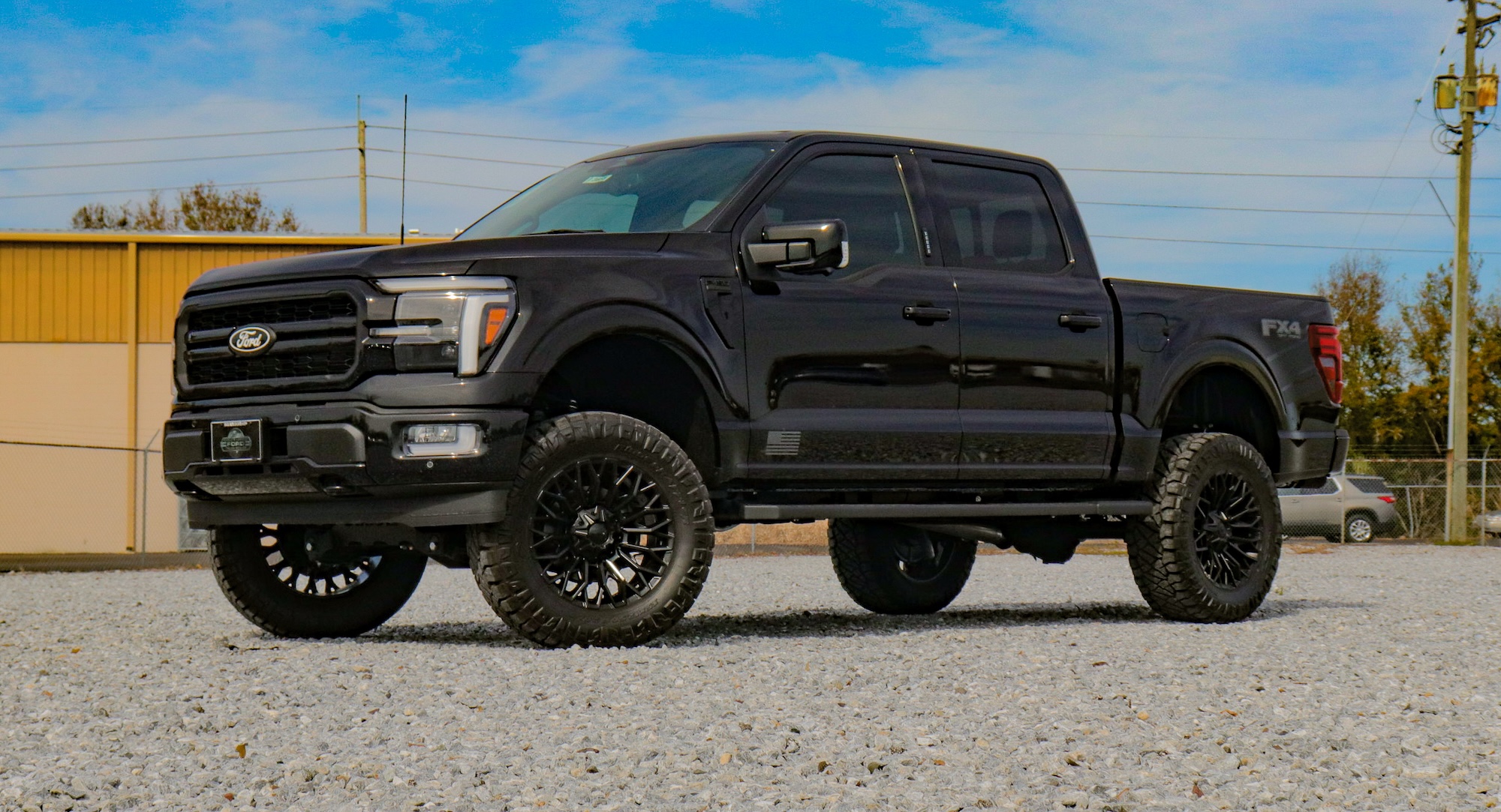 side view of a red Ford F-150