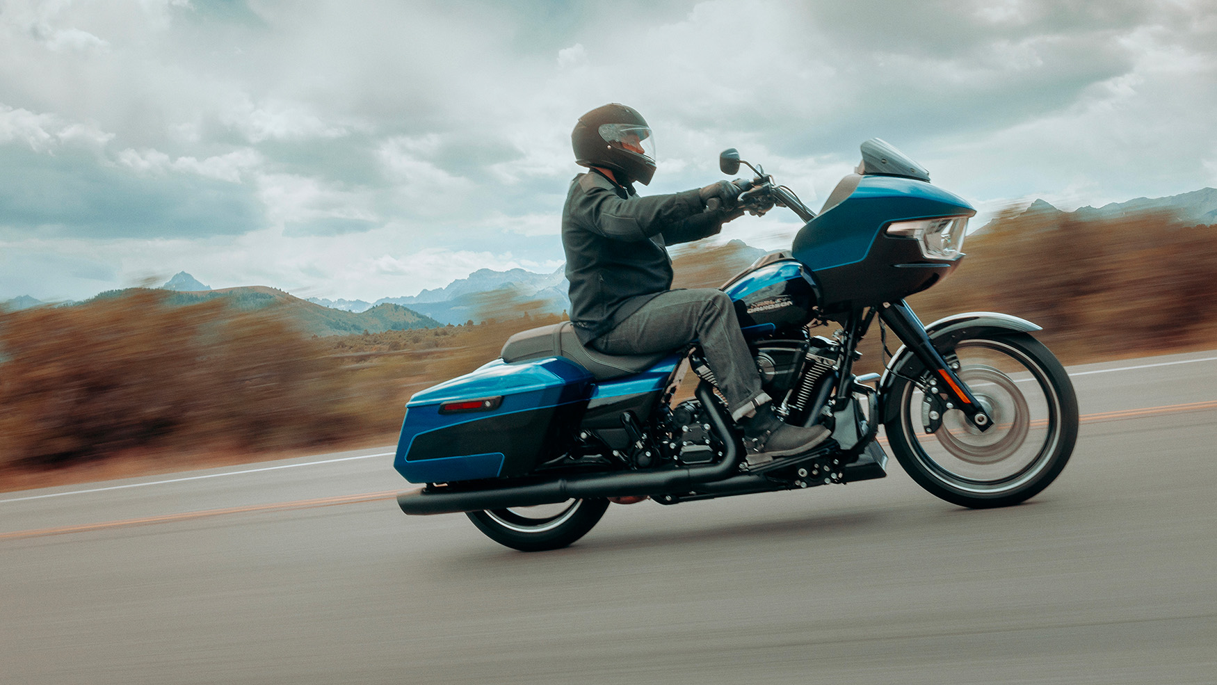Blue 2026 Harley-Davidson® Road Glide® on road