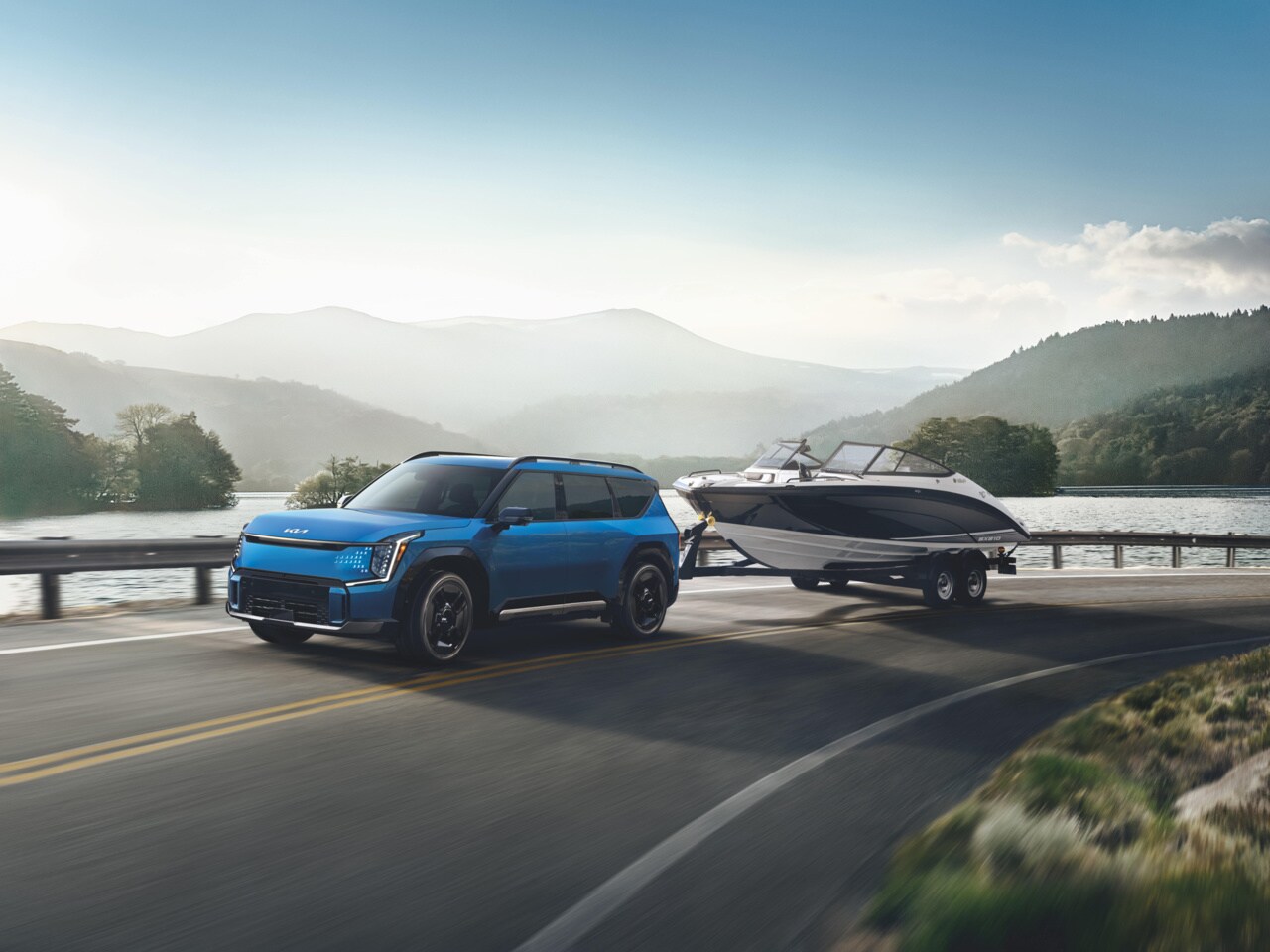 Kia EV9 and Tesla Model X comparison image
