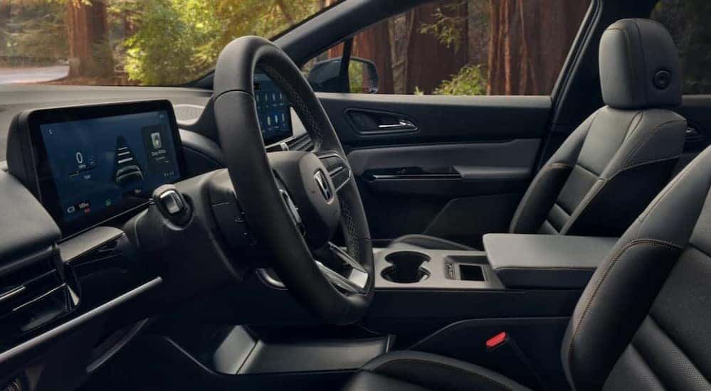 The black interior and dash are shown in a 2025 Honda Prologue Elite.