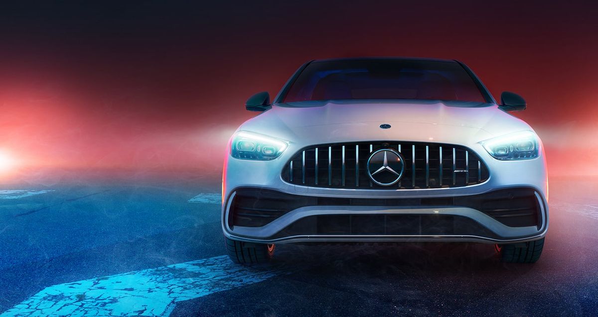2026 Mercedes-AMG C 43 sedan front view with illuminated vertical-bar grille