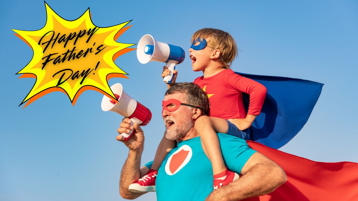 Father and Son in Superhero Costumes with Son on Father's Shoulders Using Megaphones with Happy Father's Day Explosion Graphic