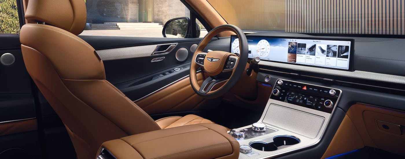 Brown leather seats inside a 2025 Genesis GV80.