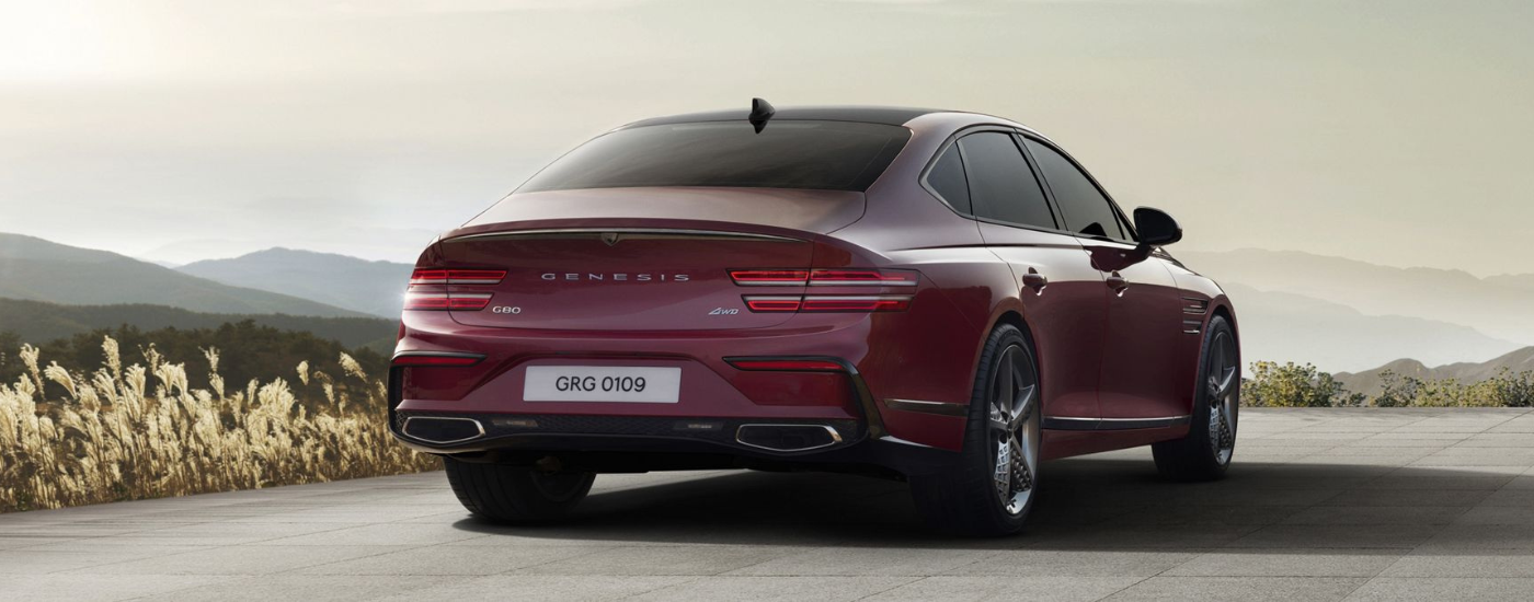 Red 2026 Genesis G80 parked from the rear