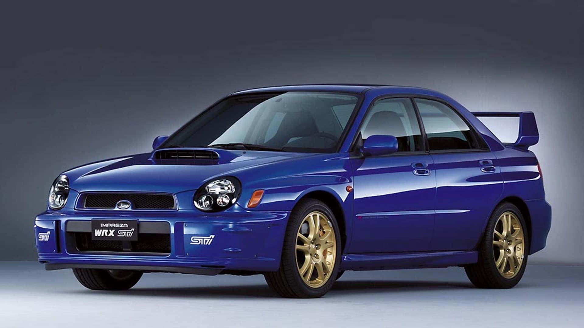 Blue 2002 Subaru Impreza WRX with bug-eye headlights