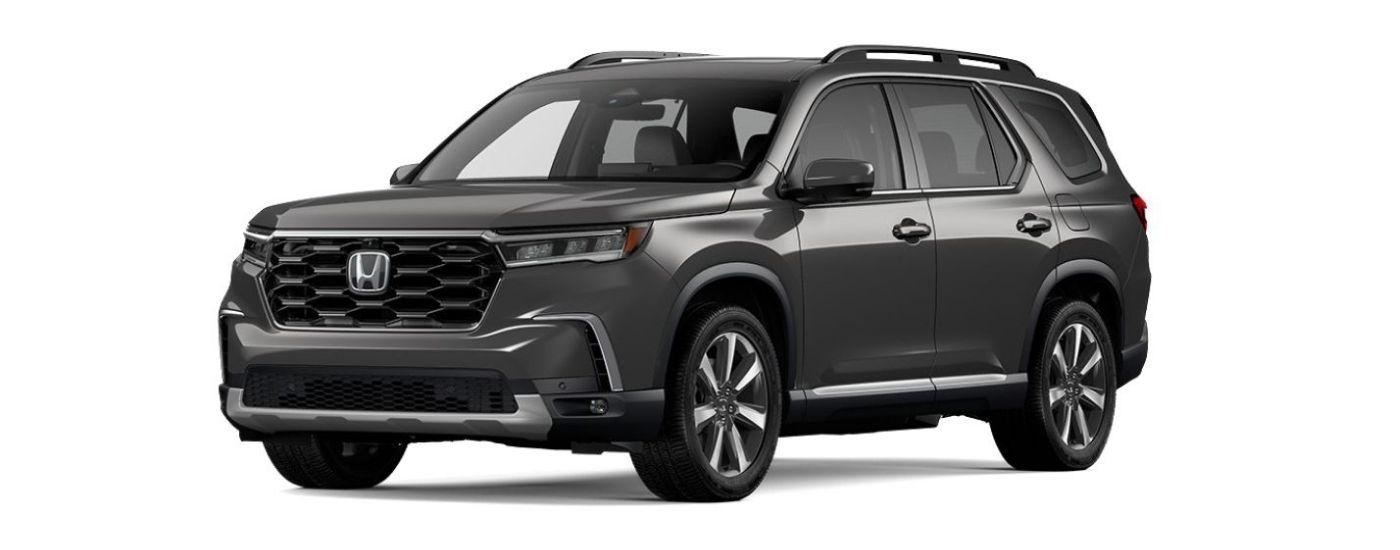 Grey 2023 Honda Pilot Elite angled left.