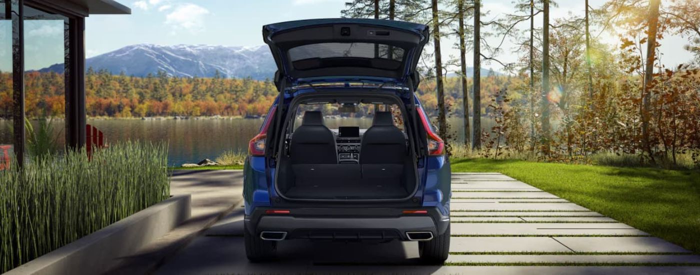 Open trunk of a blue 2026 Honda CR-V