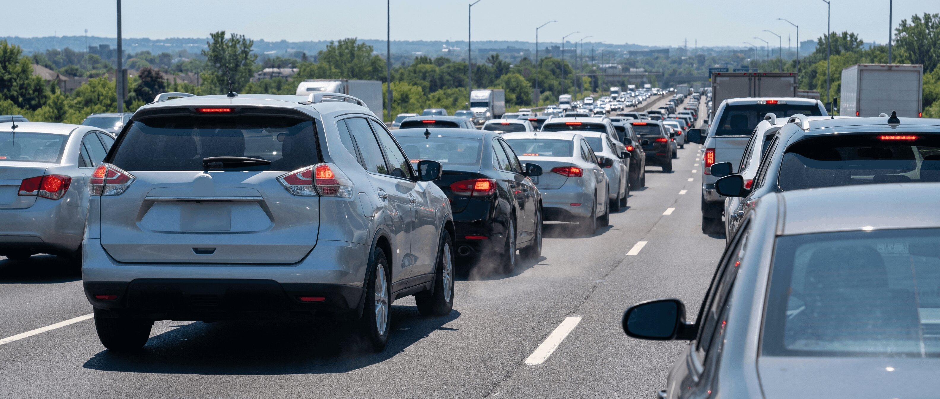 Nissan Rogue in summer Atlanta traffic on Georgia highway near Roswell showing brake heat conditions