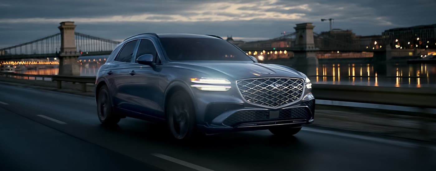 Grey 20126 Genesis GV70 for sale driving near The Villages