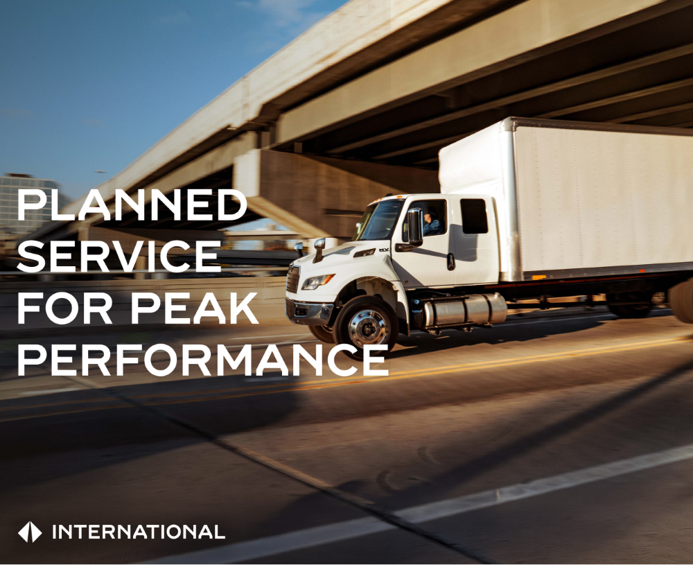International MV box truck on the road