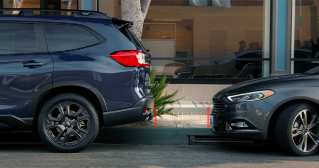 A Subaru projects straight lines representing the Reverse Automatic Braking.