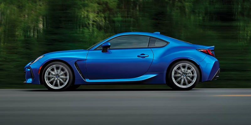 Blue 2023 Subaru BRZ coupe, side view