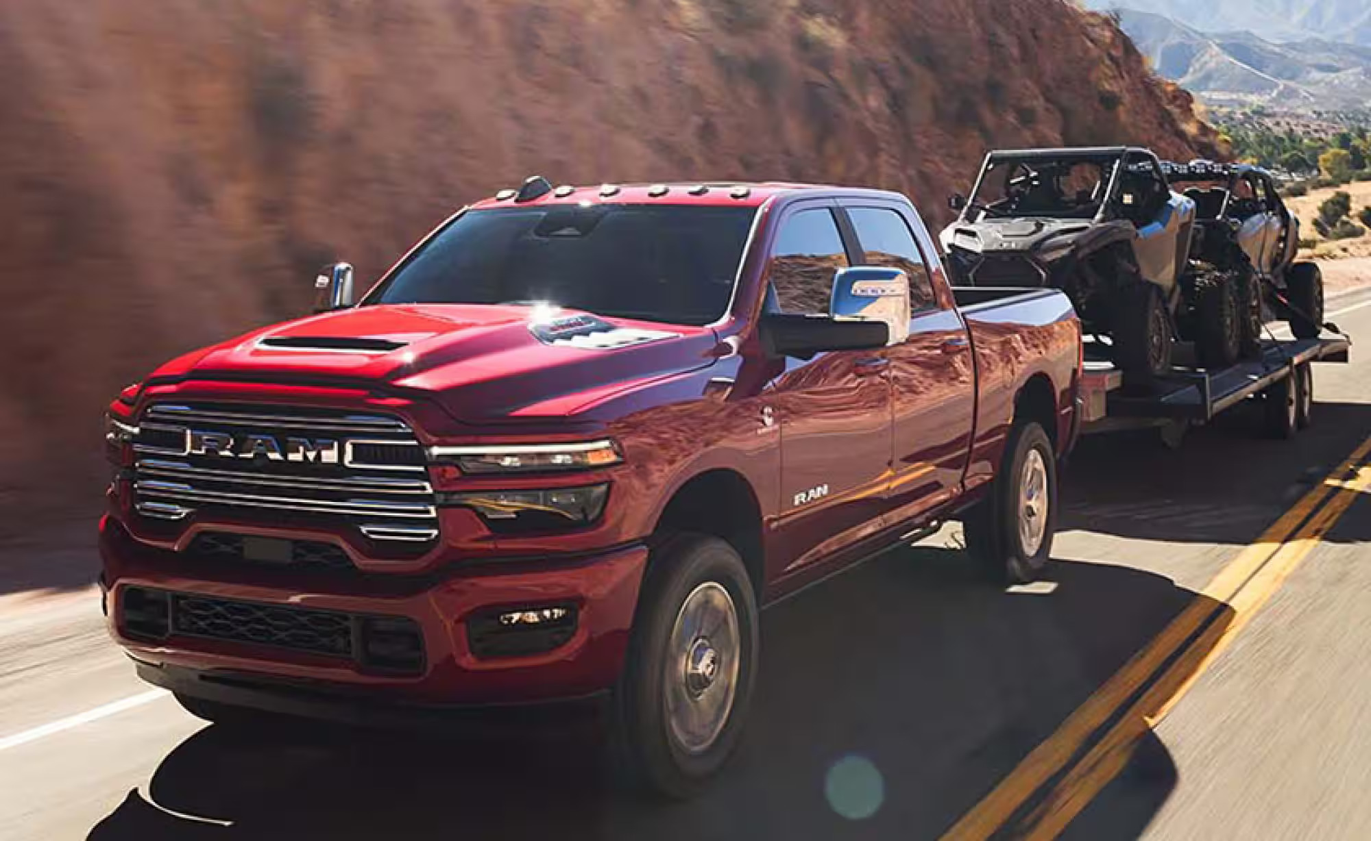 A red truck driving on the road.