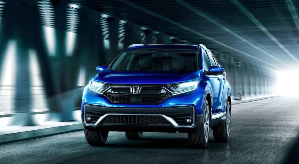 Blue 2020 Honda CR-V driving through a tunnel.