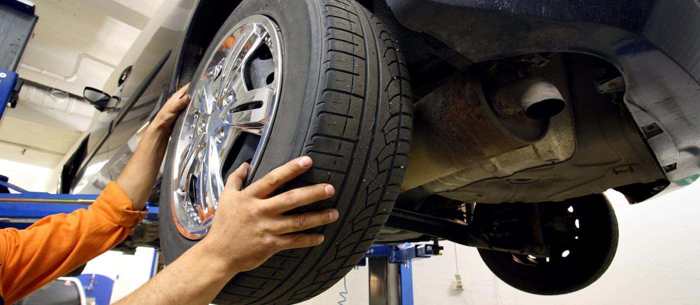 Auto Mechanic Performing Routine Car Maintenance