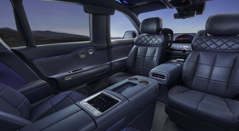 Black leather interior showing optional swivel seating in a 2027 Genesis GV90.