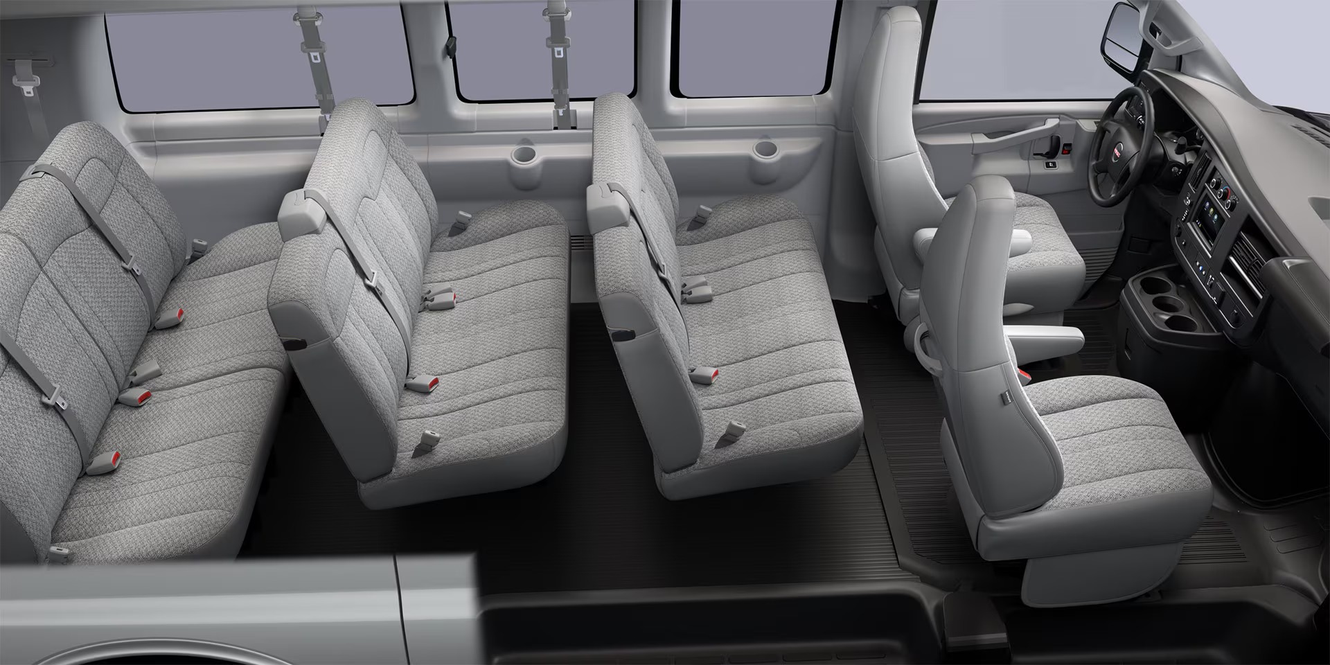 GMC Savana Passenger interior with four rows of bench seating