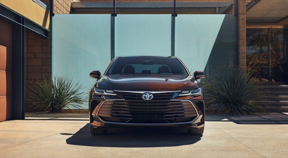 Brown 2022 Toyota Avalon parked on a driveway