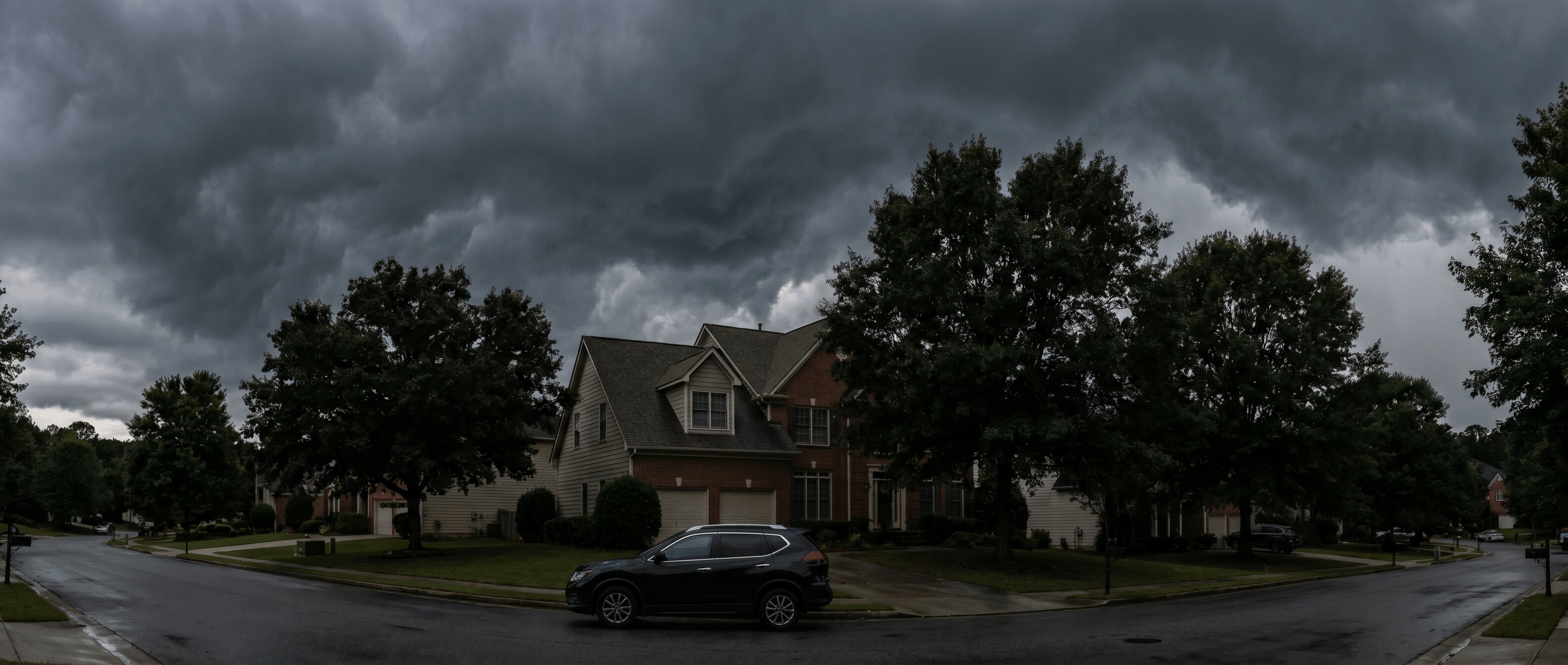 Nissan Rogue parked safely in covered garage during hail storm in Roswell, GA