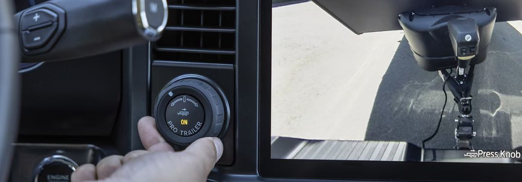 Man Using Pro Trailer Backup Assist Knob in Ford Super Duty