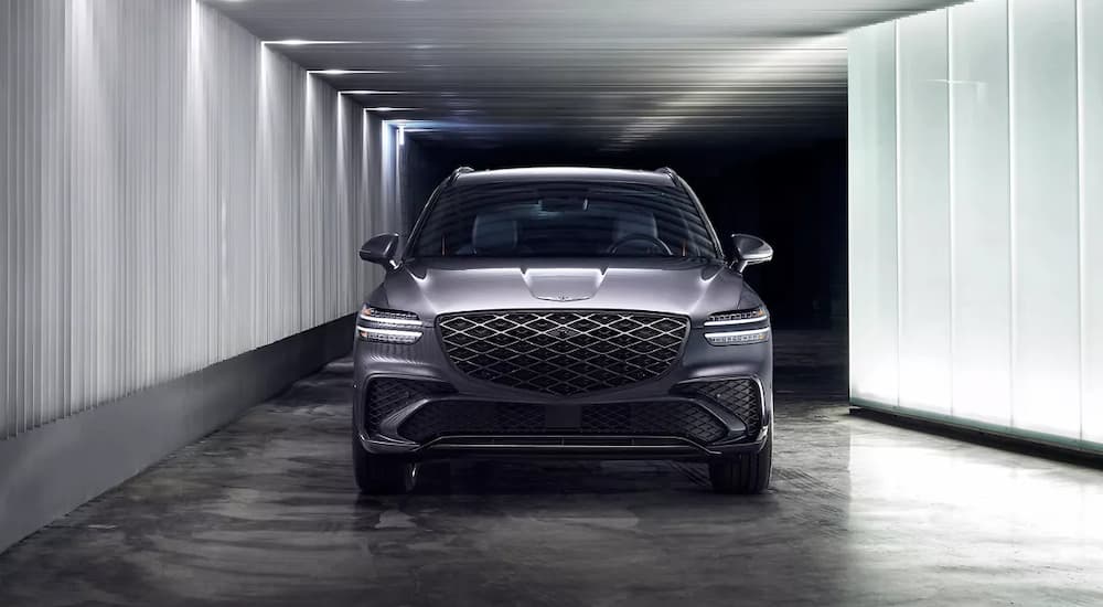 Grey 2025 Genesis GV70 driving through a tunnel