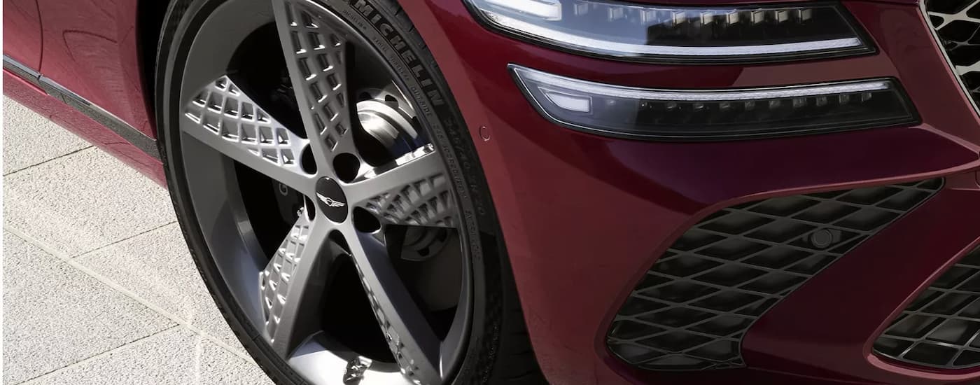 Red 2026 Genesis G80 tire and headlight