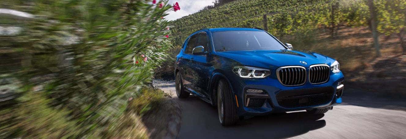 Hero image showcasing the BMW X3 in a stunning blue color.