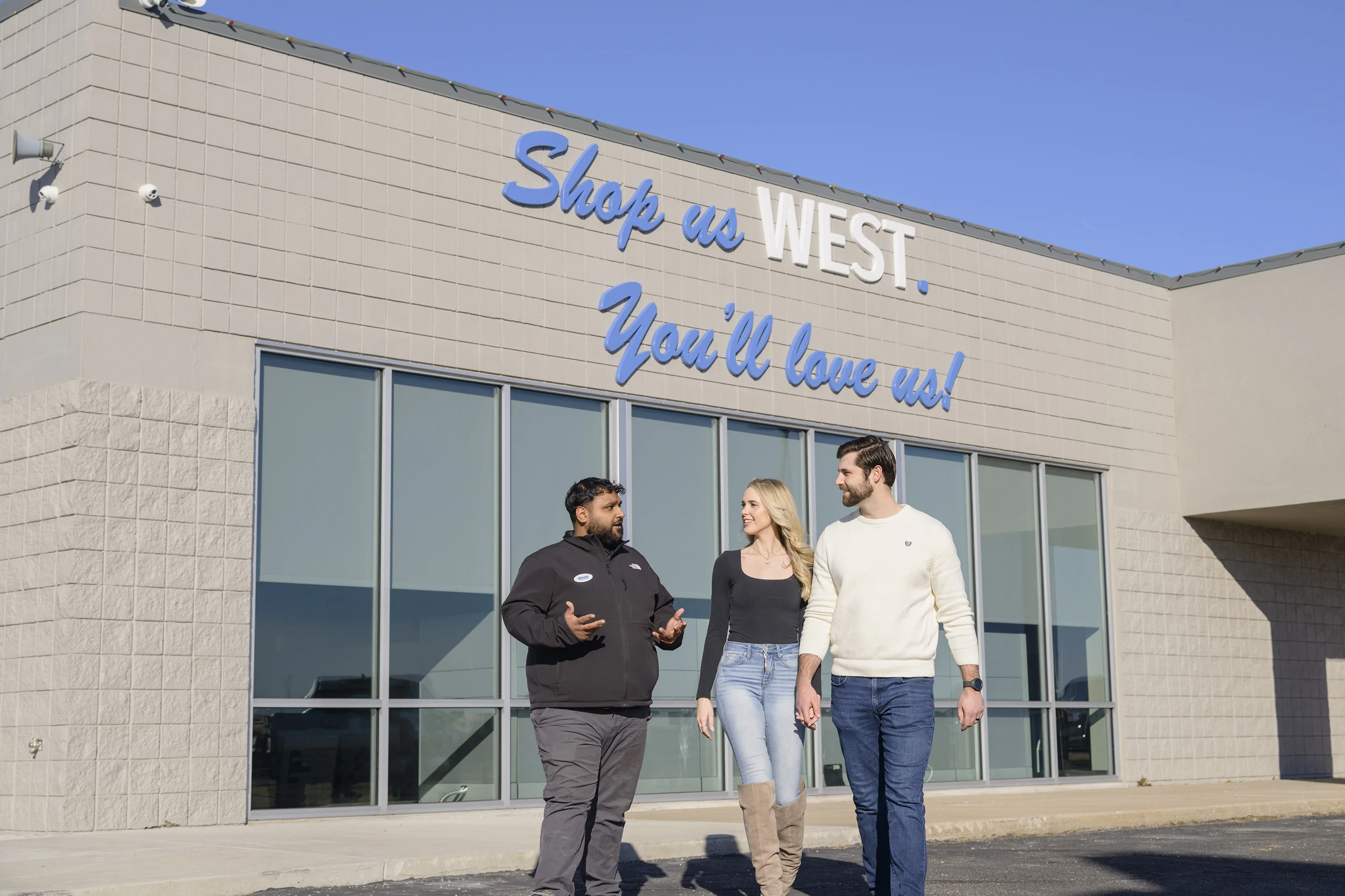 Customers talking with their Customer Experience Advocate at Don Hattan West. We provide the best car buying experience in Wichita for both new and used vehicles.