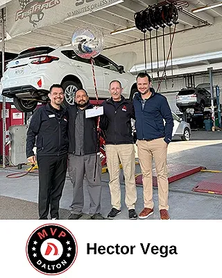 Hector Vega with Dalton Subaru team members