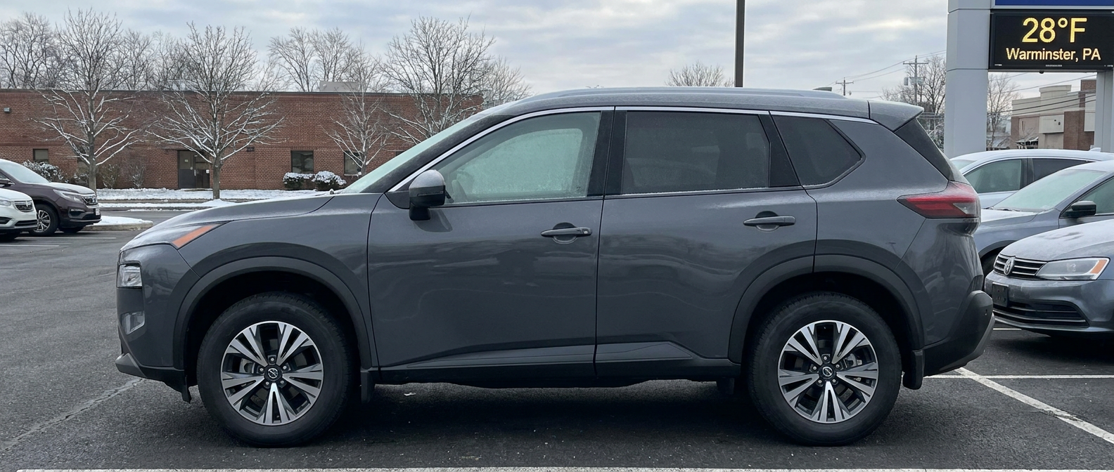 2026 Nissan Rogue parked in Warminster PA on a cold winter morning with frost on surrounding vehicles