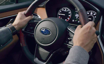 A close-up of the heated rear seat controls and climate control vents on the 2022 Subaru Legacy Touring XT.