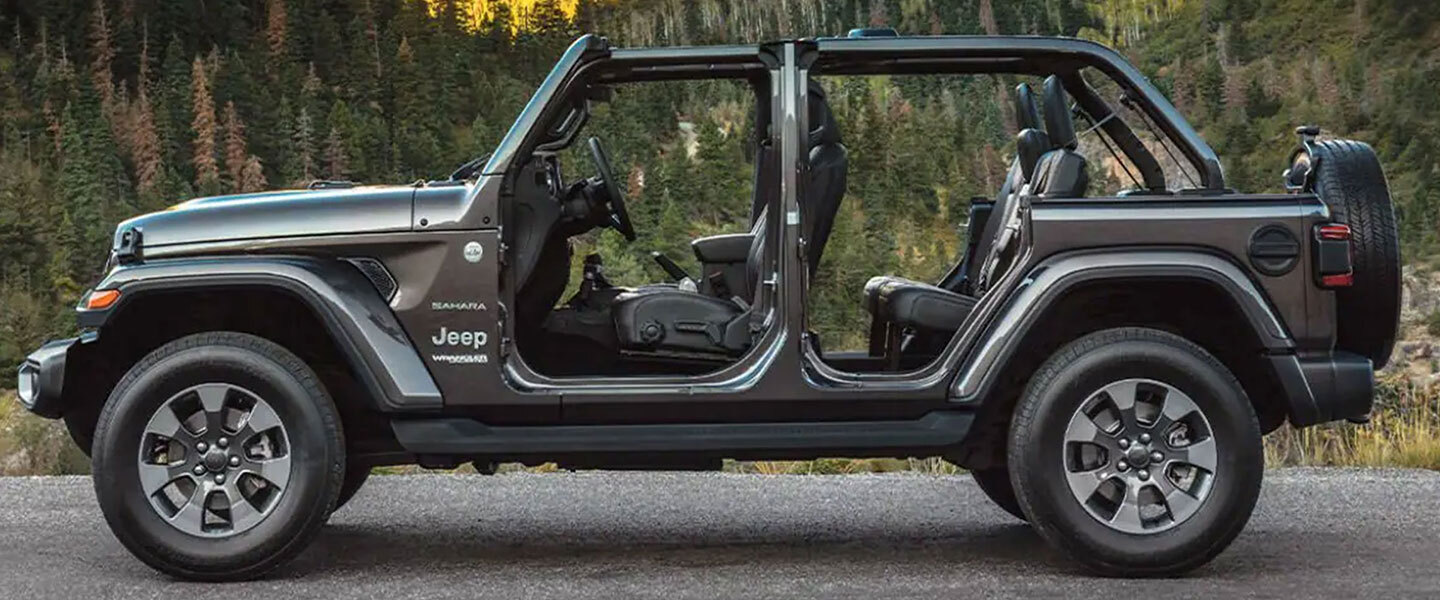 The 2022 Jeep Wrangler parked without the doors on.