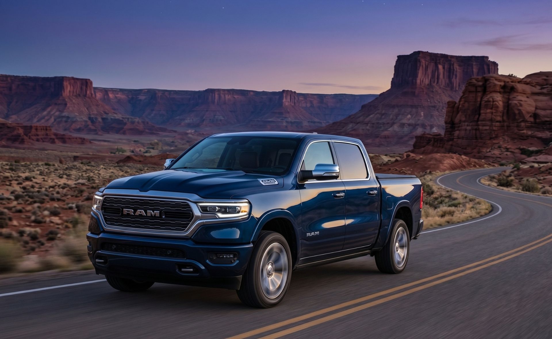 A blue Ram 1500 crew cab pickup truck driving on a winding road through a scenic desert landscape with large red rock formations at dusk.