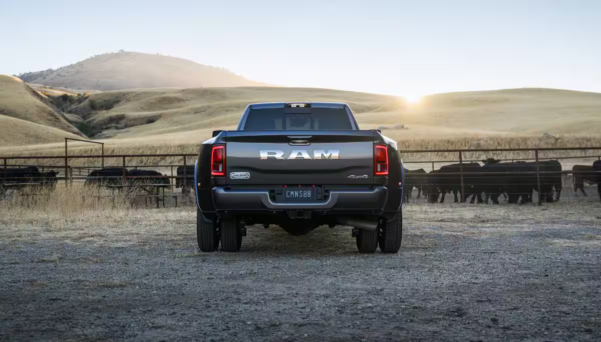 A gray ram truck sitting parked.