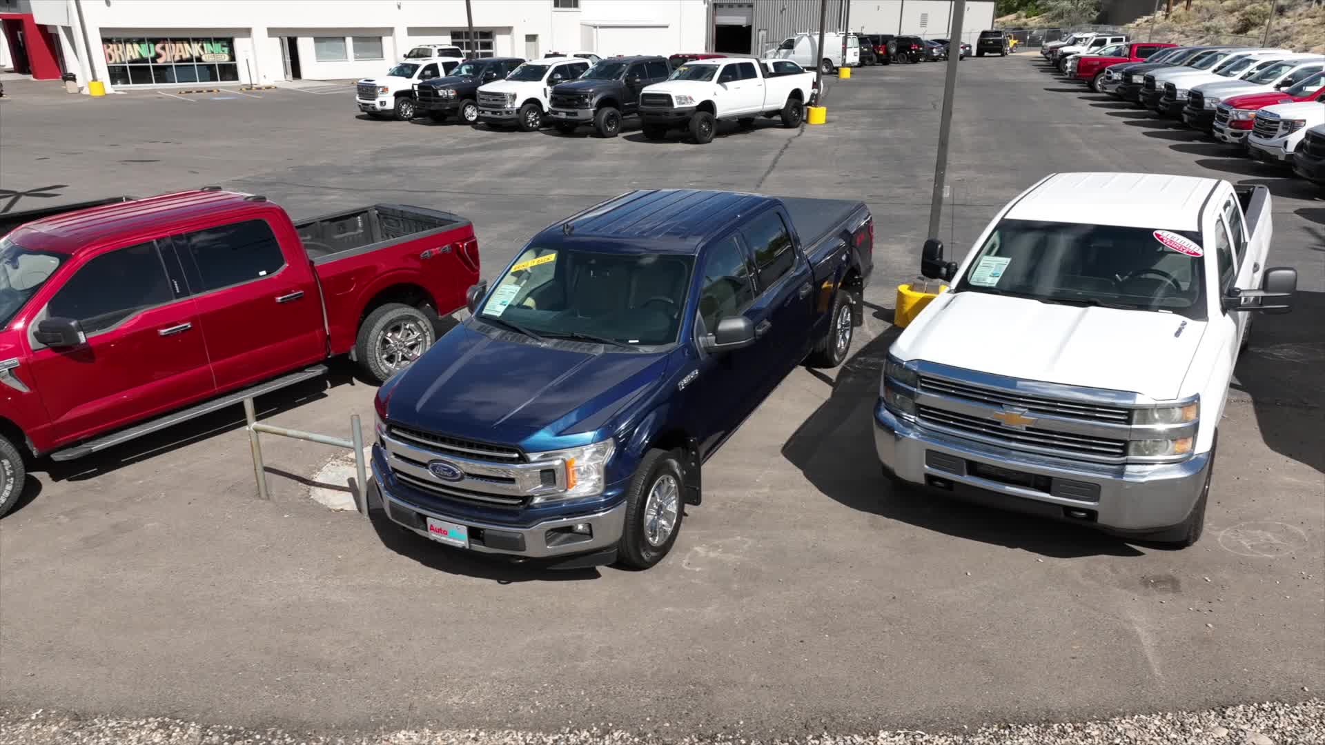 Customer reviewing auto financing paperwork
