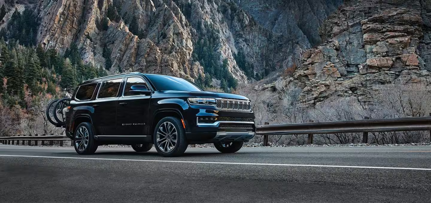 a black suv on a road