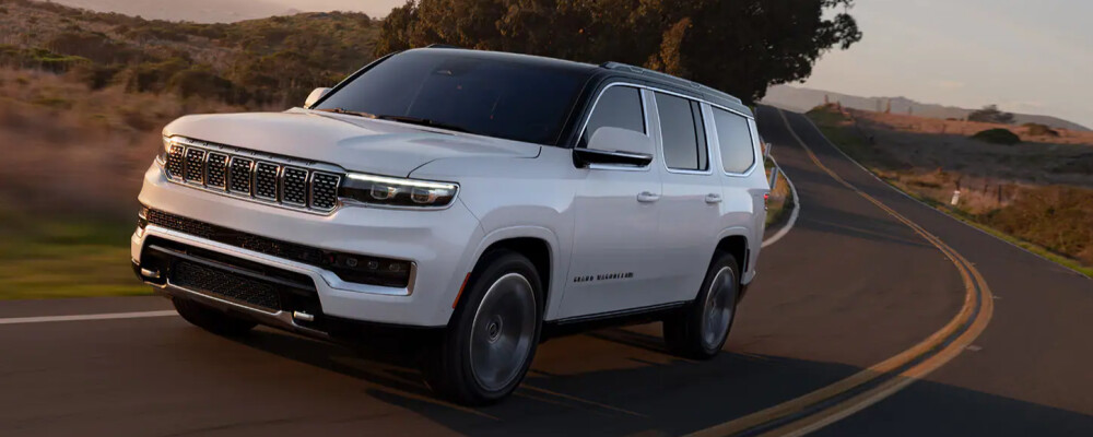 White 2022 Jeep Grand Wagoneer on highway