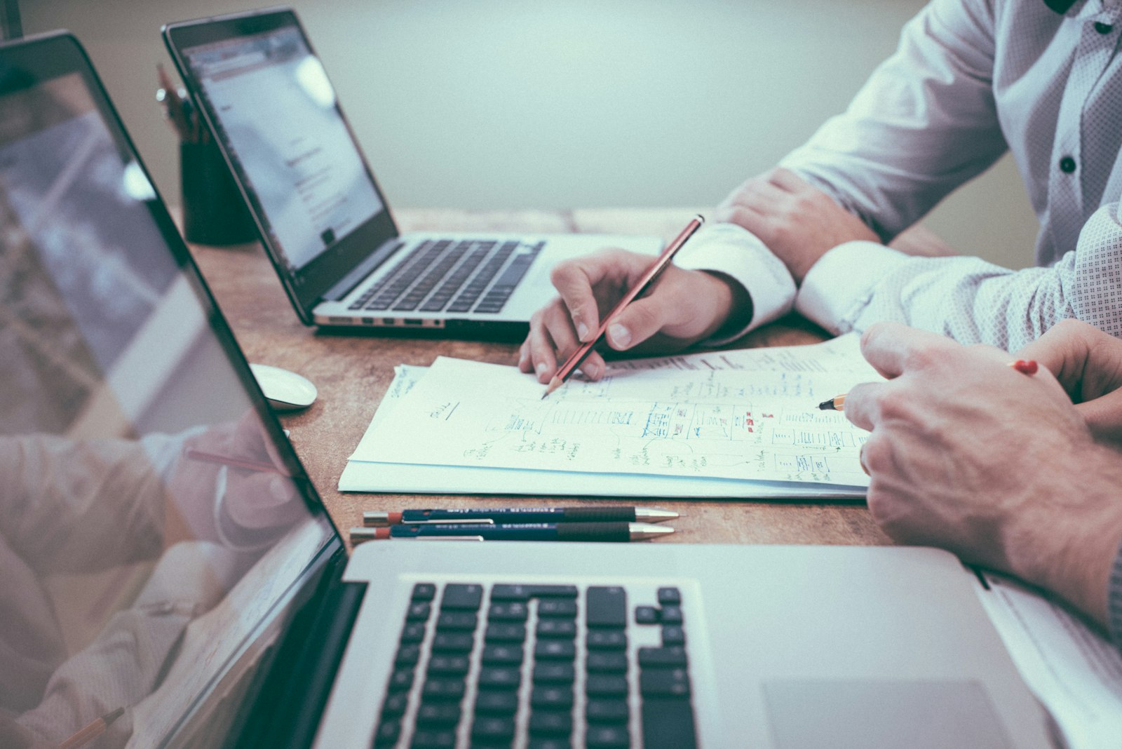 Financing paperwork and calculator on a desk
