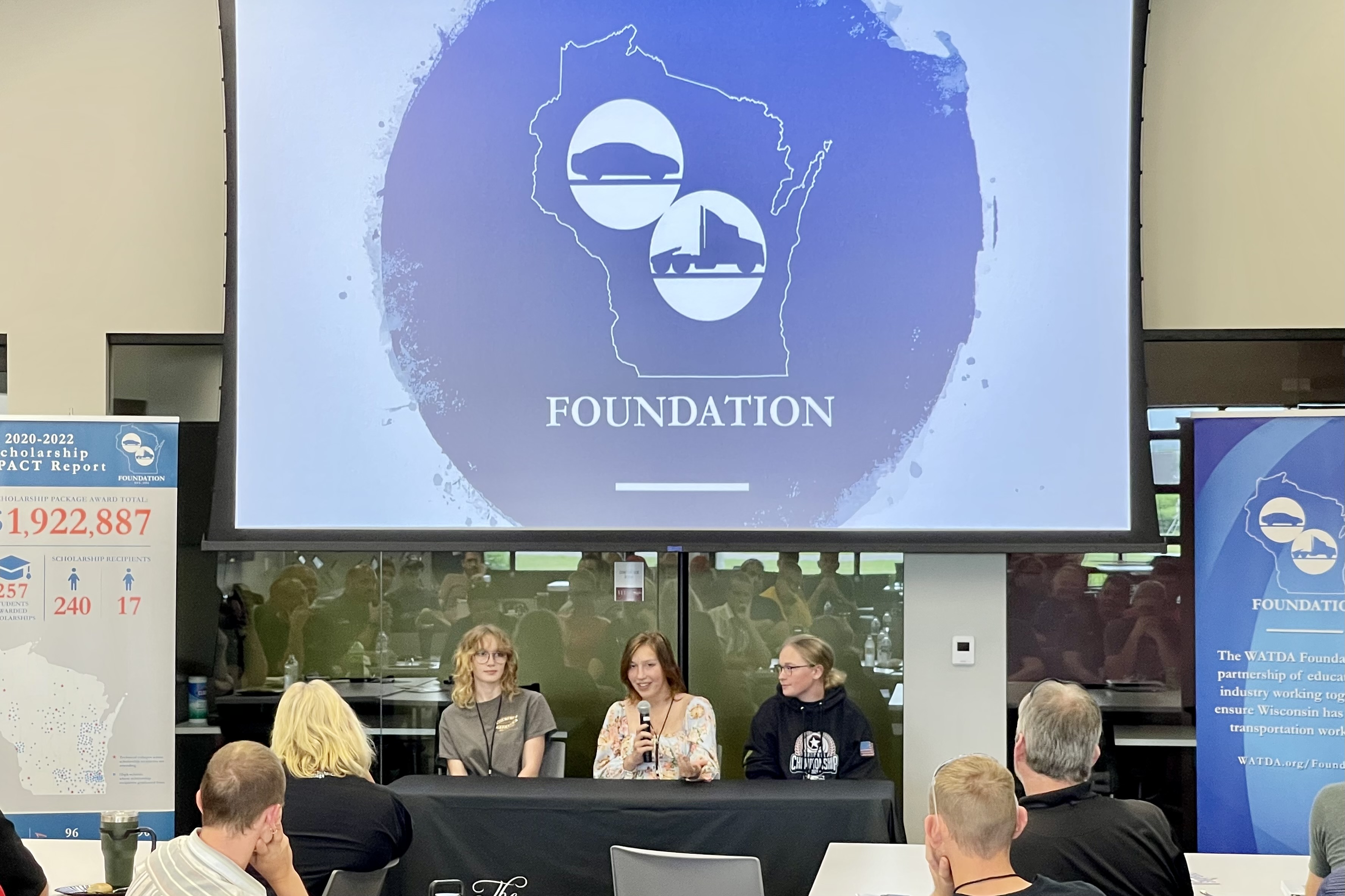 Hannah Ketter speaking on a panel of all-female technicians at the teacher training institute