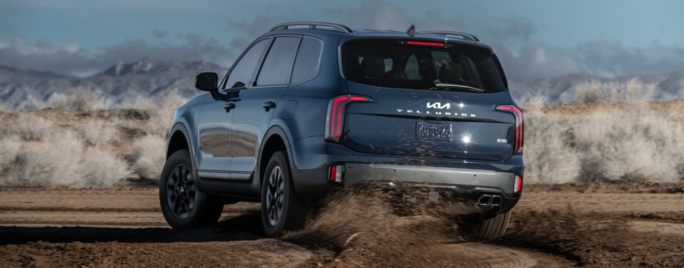 Blue 2023 Kia Telluride X-Pro off-roading