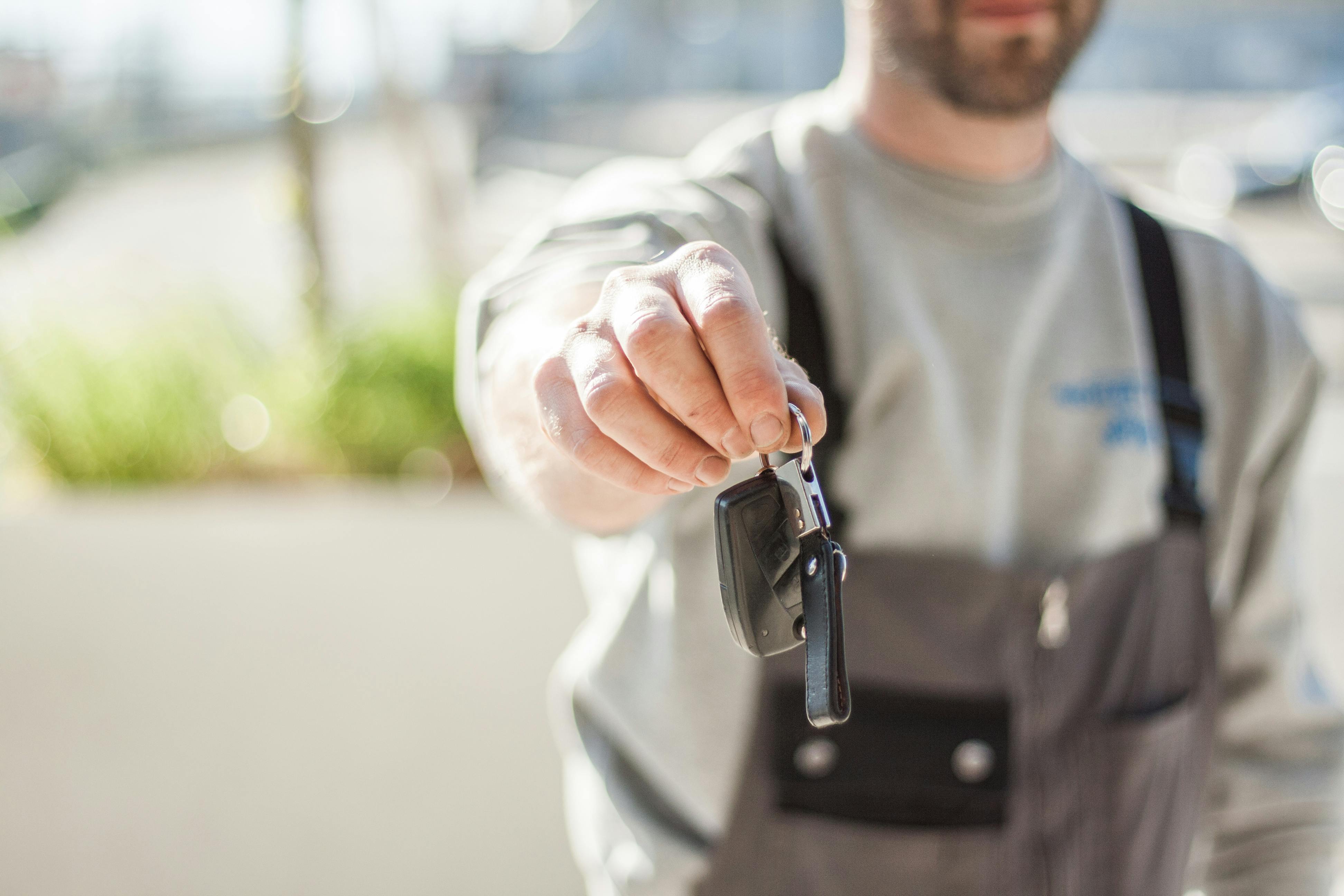 Car keys and paperwork for vehicle trade-in appraisal