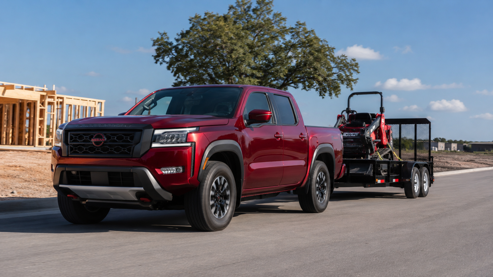 A rugged Nissan Frontier V6 parked on a scenic trail, highlighting its reliability and off-road capability.