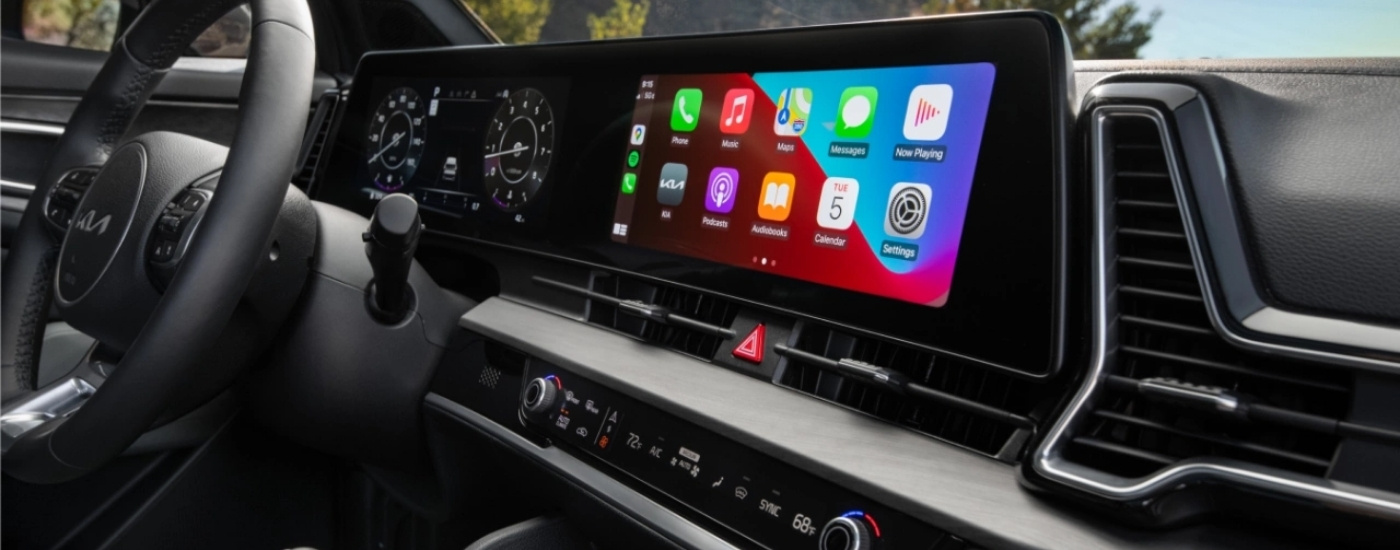 Close-up on the steering wheel and dashboard in a 2024 Kia Sportage