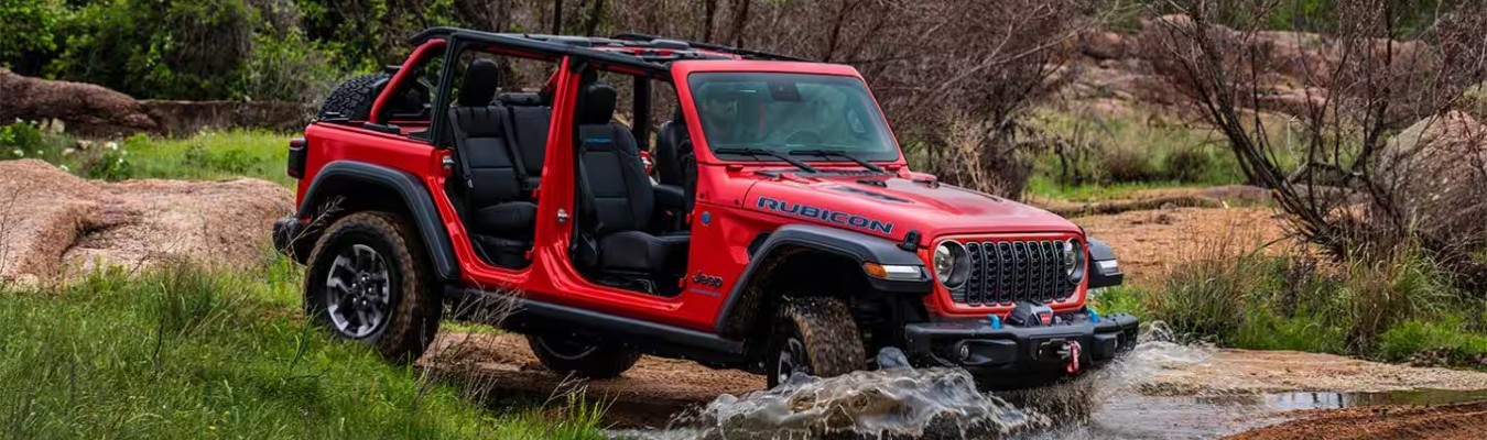 2025 Jeep Wrangler Exterior Passenger Side Front Profile while Fording Water