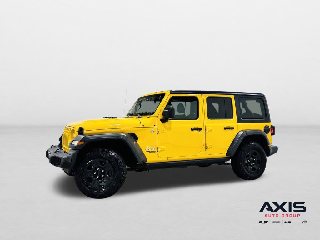 Yellow Jeep Wrangler at Axis Auto Group in Jersey City