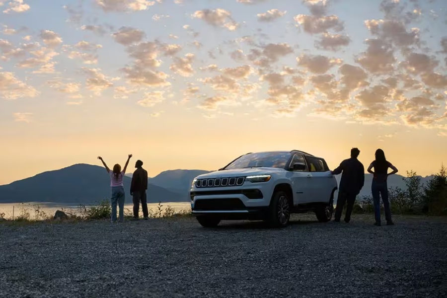 2024 Jeep Compass Exterior Driver Side Front Profile Surrounded by People