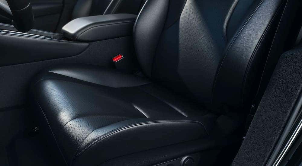 A black leather seat is shown in the interior of a 2023 Honda Accord Sport L Hybrid.