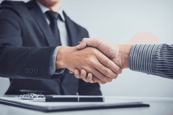 Handshake closing a vehicle purchase deal